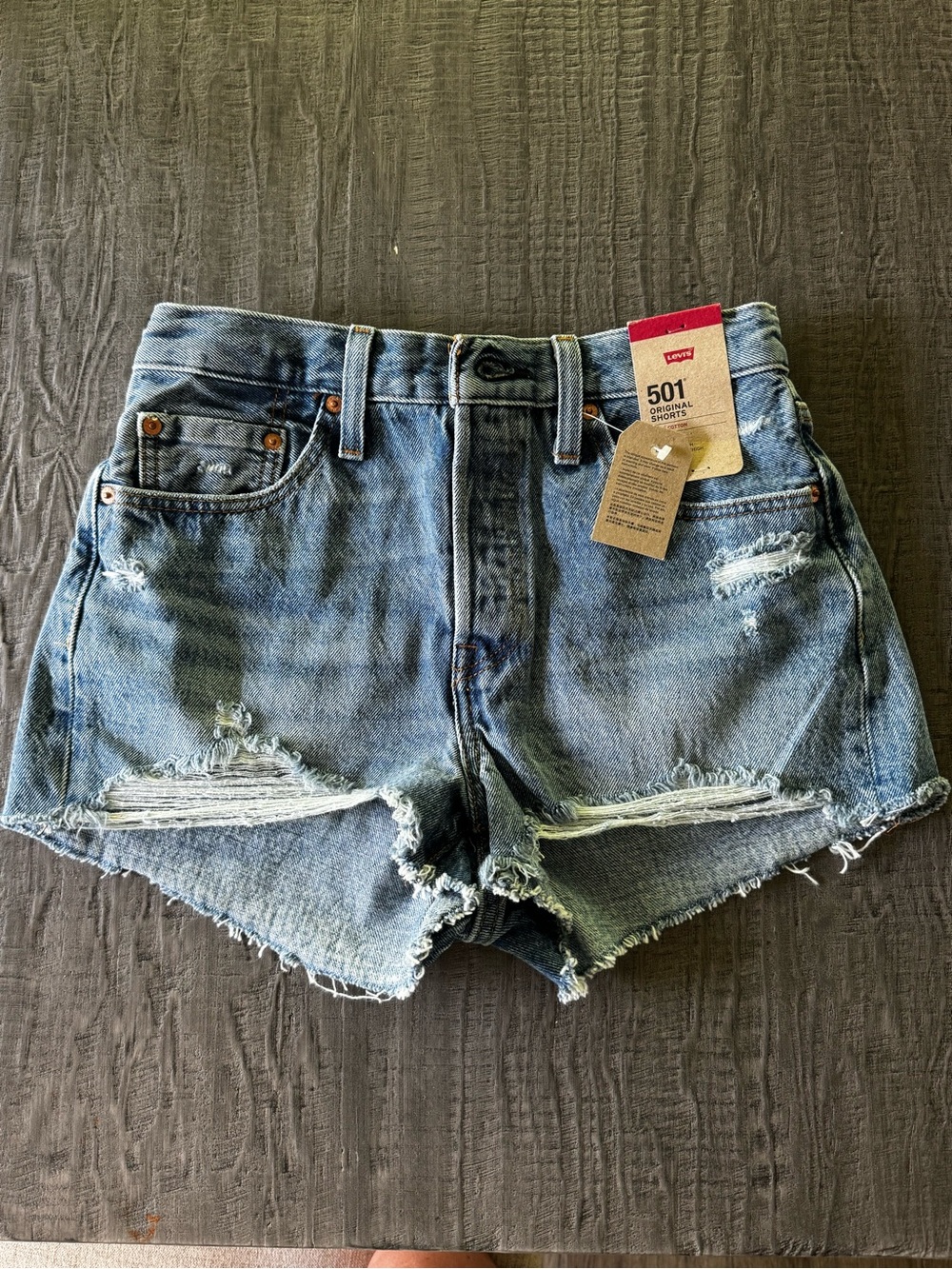 Levi's High-Rise Distressed Jean Shorts in Light Blue Wash